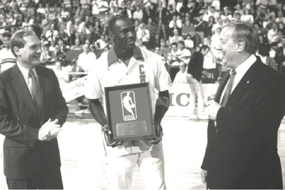 Michael Jordan being presented with the Master Lock/NBA Defensive Player of the Year Award, 1988.