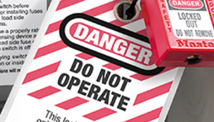 A padlock and label saying 'Danger - Do Not Operate'