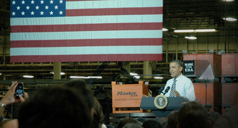 President Obama bezoekt Master Lock om Amerikaanse productie te bespreken